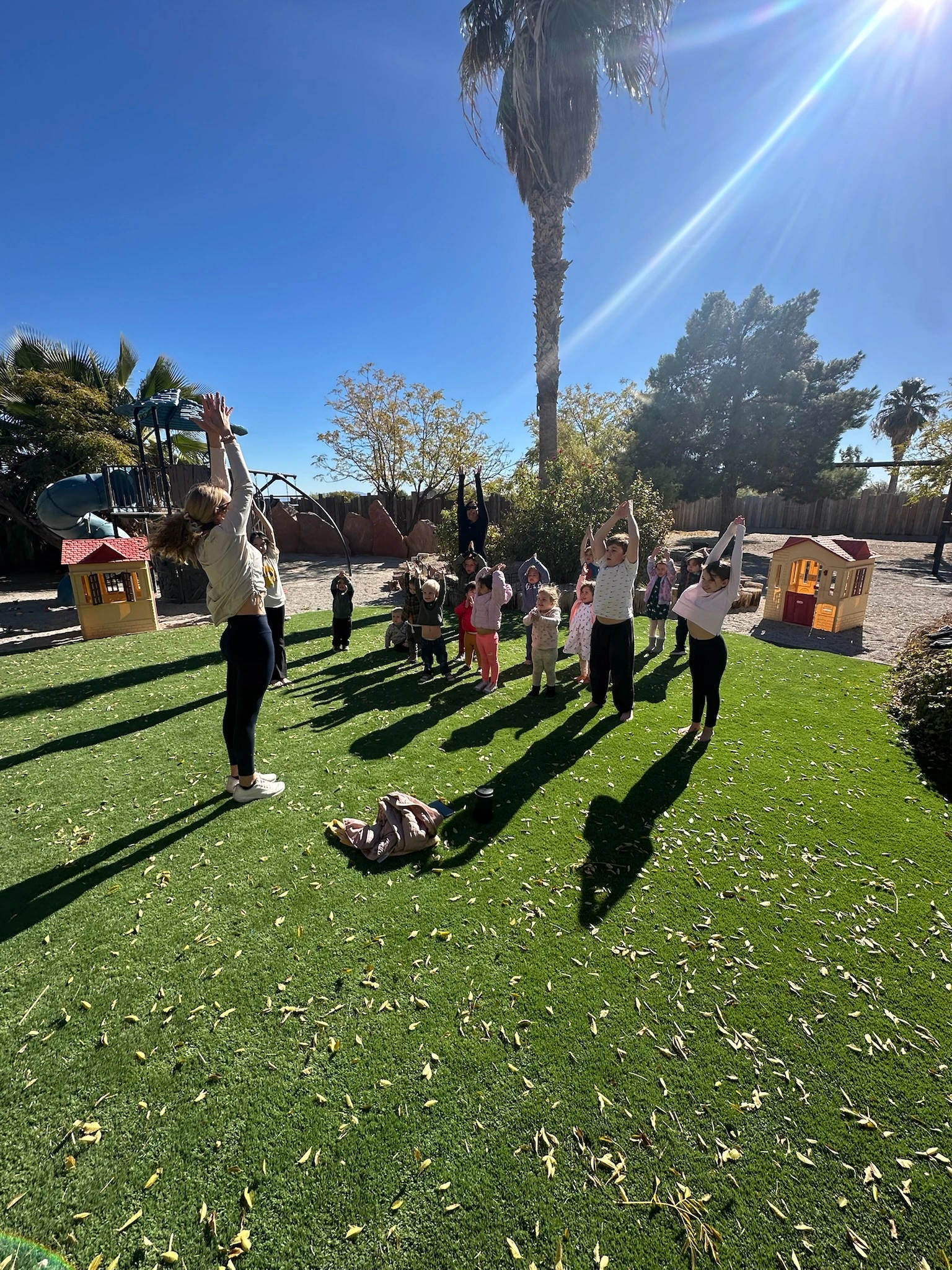 Montessori learning center outdoor classroom - children exploring nature and learning in beautiful natural setting